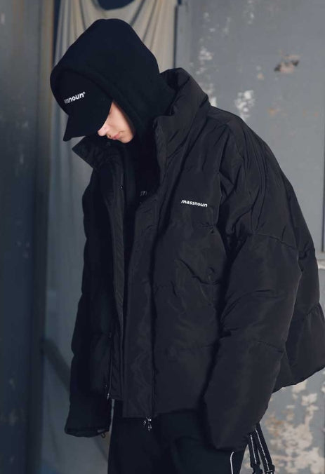 メスノウン(MASSNOUN) SL LOGO REFLECTIVE OVERSIZED PADDING JUMPER MFEPD001-BK