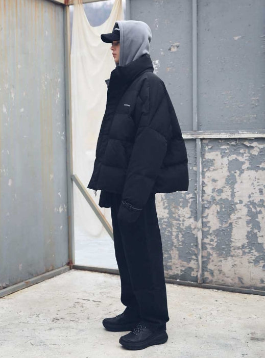 メスノウン(MASSNOUN) SL LOGO REFLECTIVE OVERSIZED PADDING JUMPER MFEPD001-BK