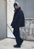 メスノウン(MASSNOUN) SL LOGO REFLECTIVE OVERSIZED PADDING JUMPER MFEPD001-BK