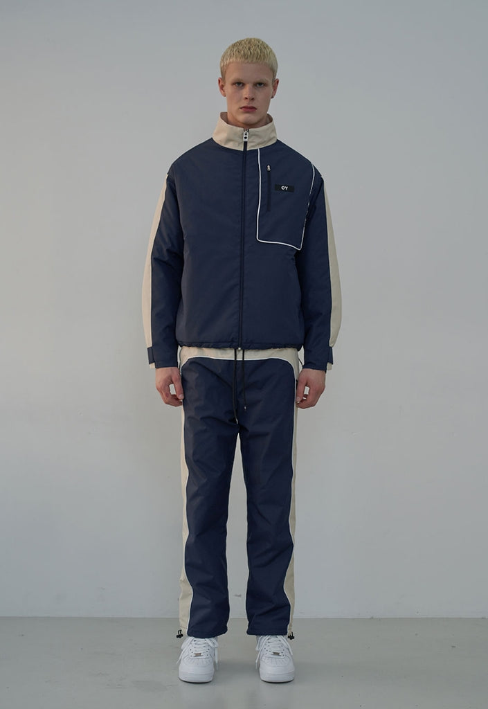 オーワイ(OY) PIPING BLOCK TRACK JACKET-NAVY