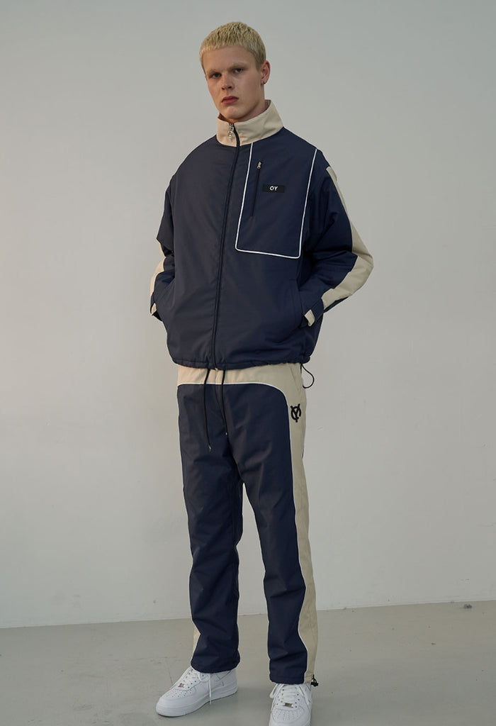 オーワイ(OY) PIPING BLOCK TRACK JACKET-NAVY