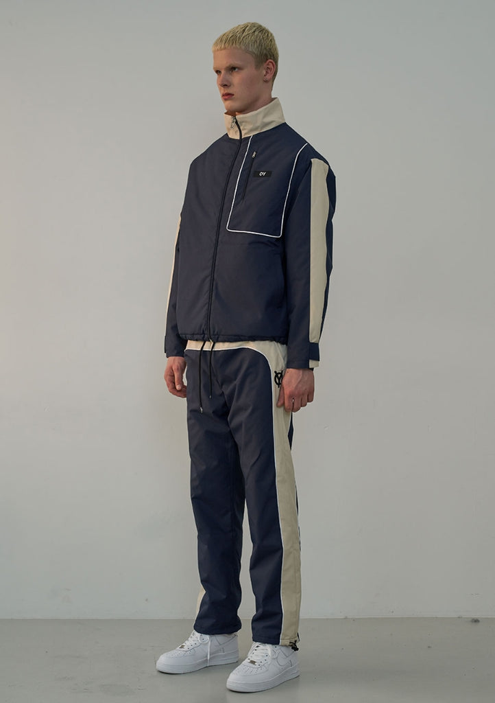 オーワイ(OY) PIPING BLOCK TRACK JACKET-NAVY
