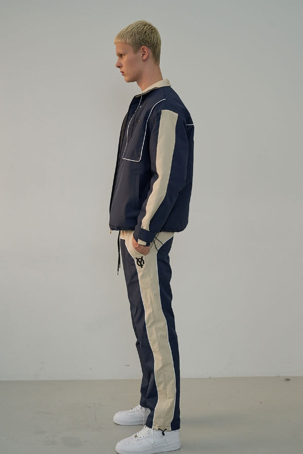 オーワイ(OY) PIPING BLOCK TRACK JACKET-NAVY