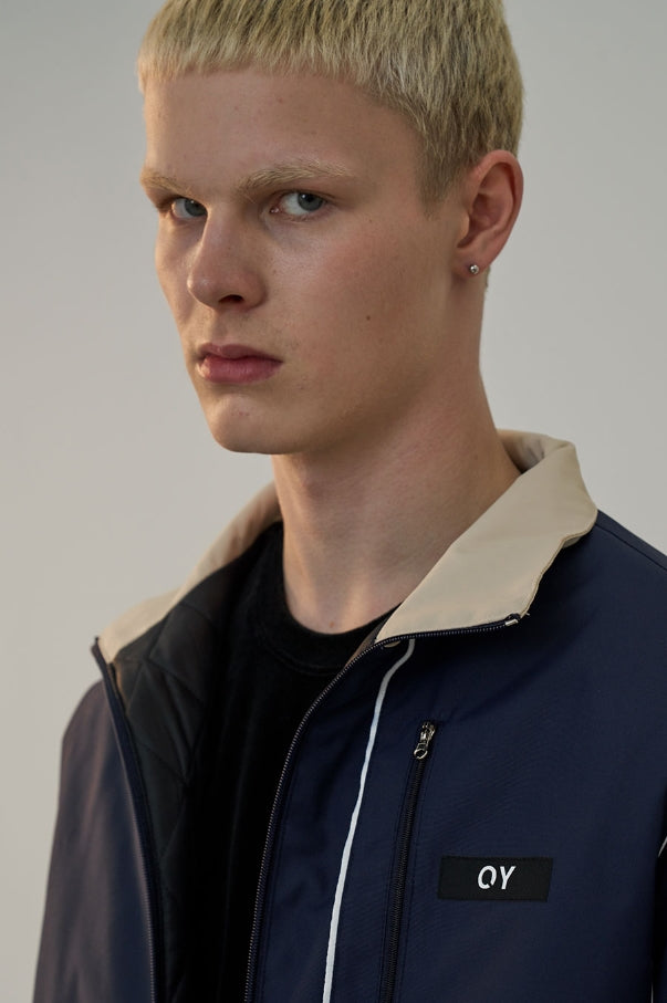 オーワイ(OY) PIPING BLOCK TRACK JACKET-NAVY