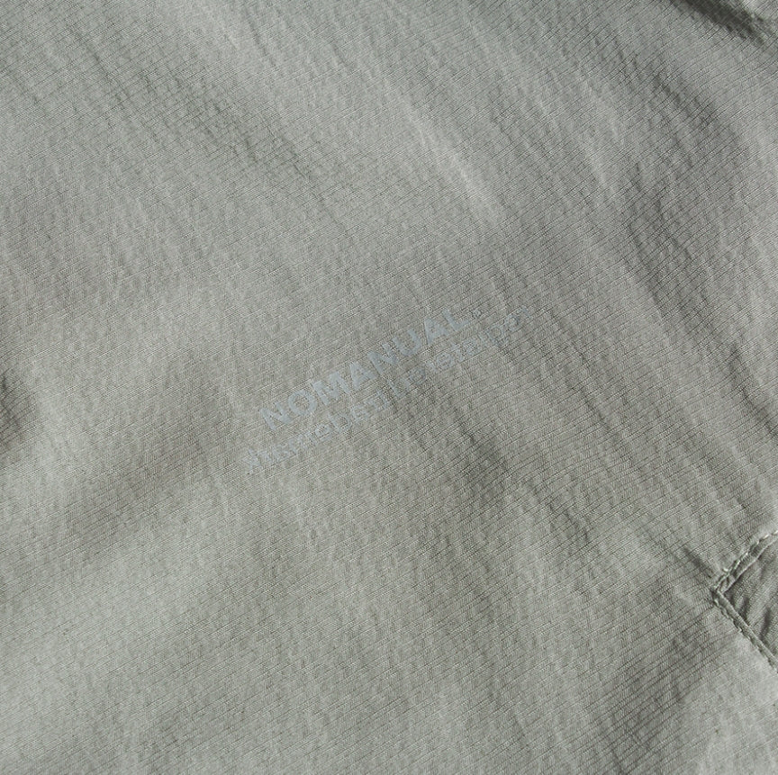 NOMANUAL(ノーマニュアル) NM PATCH TRAINING JACKET - KHAKI