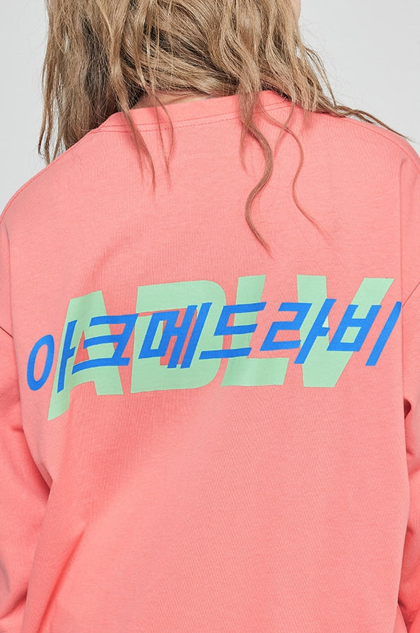 アクメドラビ(acme' de la vie) ADLV HANGUL LOGO LONG SLEEVE T-SHIRT CORAL