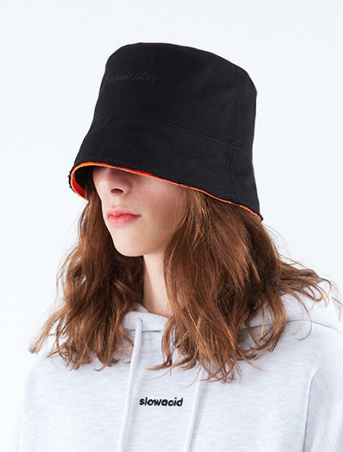 スローアシッド(SLOW ACID) Lettering Cutting Bucket Hat (BLACK/ORANGE)