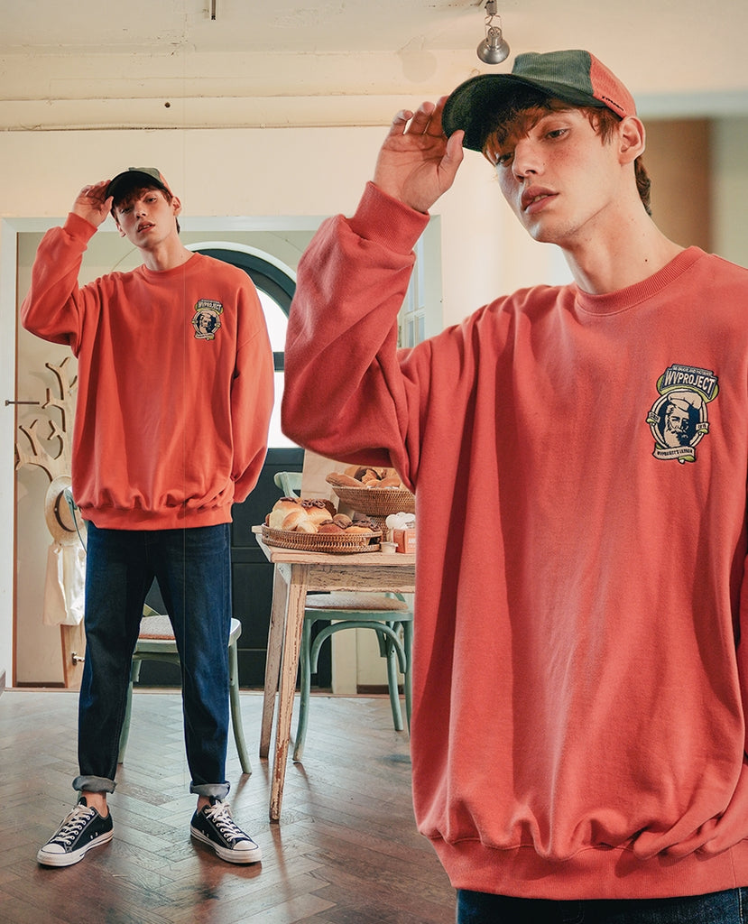 ダブルユーブイプロジェクト(WV PROJECT) Baker Emblem Sweatshirt Dark Orange JJMT7409