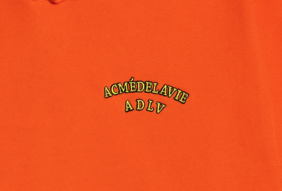アクメドラビ(acme' de la vie)  TWO COLORS EMBROIDERY HOODIE ORANGE