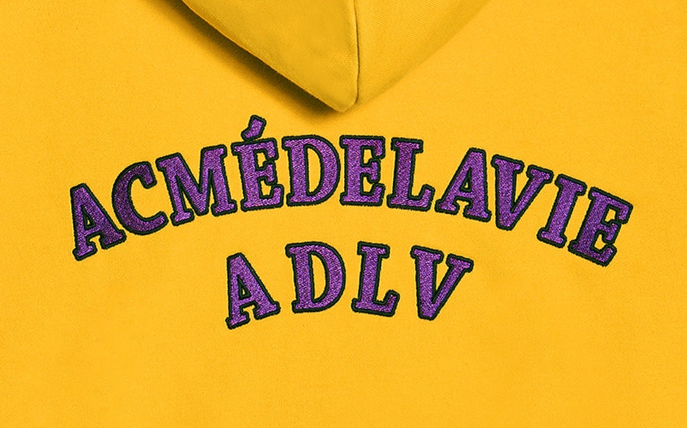 アクメドラビ(acme' de la vie)  TWO COLORS EMBROIDERY HOODIE MUSTARD