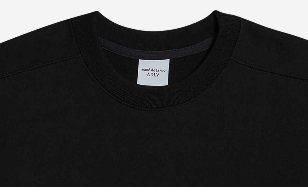 アクメドラビ(acme' de la vie)  TWO COLORS EMBROIDERY SWEAT SHIRT BLACK