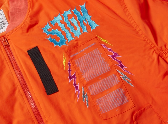 STIGMA(スティグマ) WOLF OVERSIZED QUILTED MA-1 JACKET ORANGE