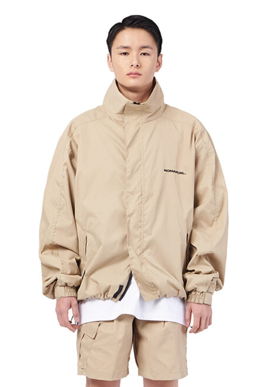 NOMANUAL(ノーマニュアル)  FD WINDBREAKER JACKET - BEIGE