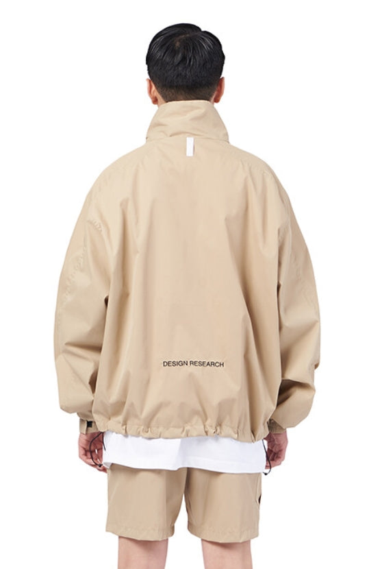NOMANUAL(ノーマニュアル)  FD WINDBREAKER JACKET - BEIGE