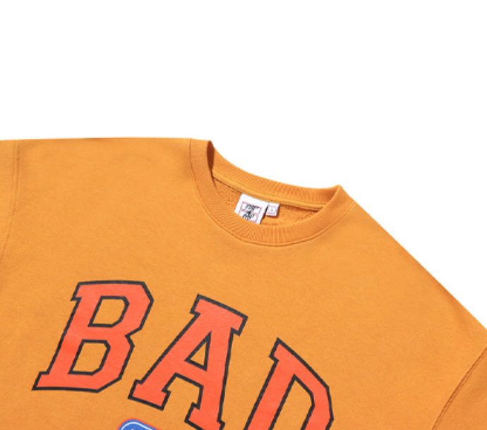 ベドインベド(BADINBAD) BAD LOGO SWEAT SHIRT_YELLOW