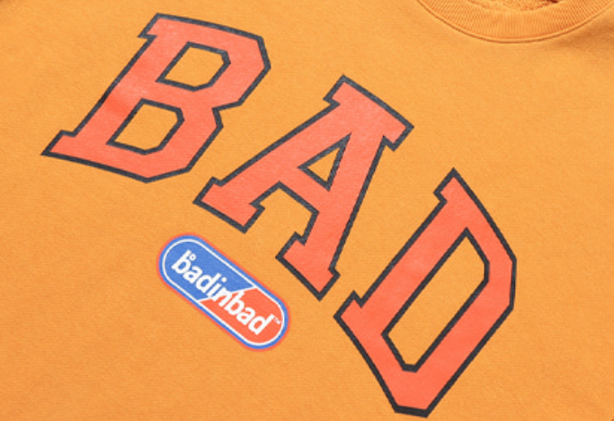ベドインベド(BADINBAD) BAD LOGO SWEAT SHIRT_YELLOW