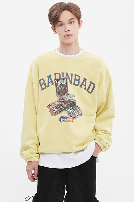 ベドインベド(BADINBAD) BAD TOOL SWEAT SHIRT_LIGHT YELLOW