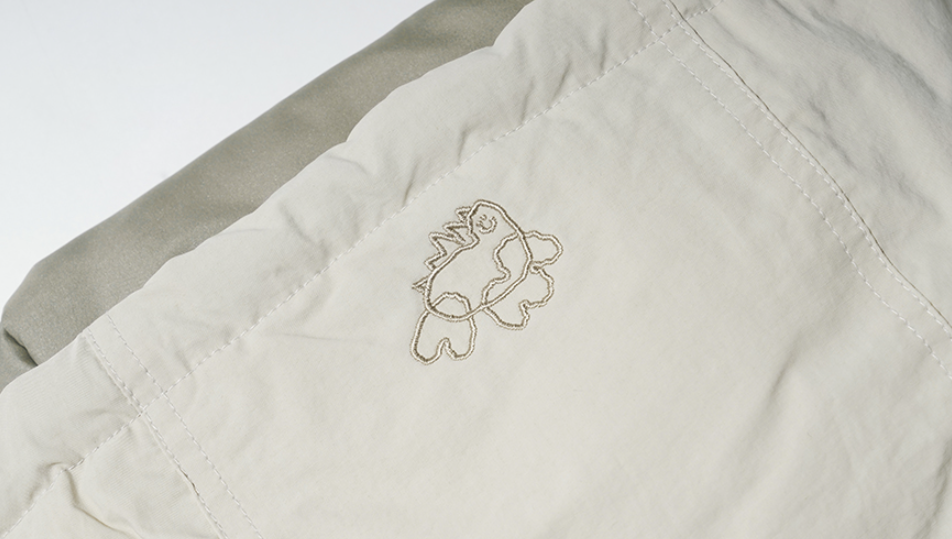 ダブルユーブイプロジェクト(WV PROJECT) Woven Hooded Coach Jacket Beige JIOT7540