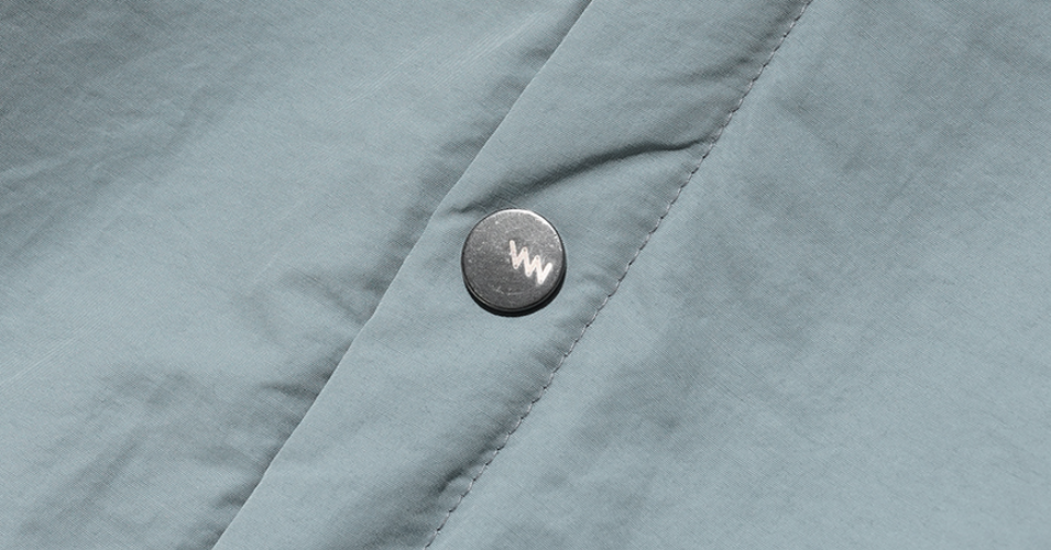 ダブルユーブイプロジェクト(WV PROJECT) Woven Hooded Coach Jacket Blue JIOT7540