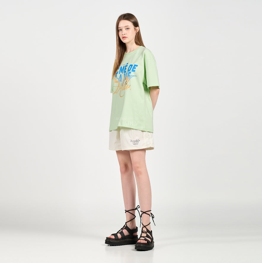 アクメドラビ(acme' de la vie) BACKGROUND LOGO SHORT SLEEVE T-SHIRT MINT
