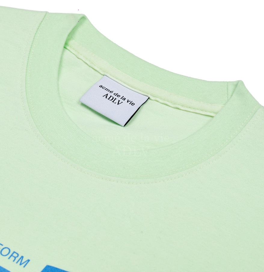 アクメドラビ(acme' de la vie) BACKGROUND LOGO SHORT SLEEVE T-SHIRT MINT