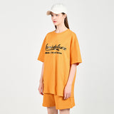 アクメドラビ(acme' de la vie) GEL PRINTING LOGO SHORT SLEEVE T-SHIRT ORANGE