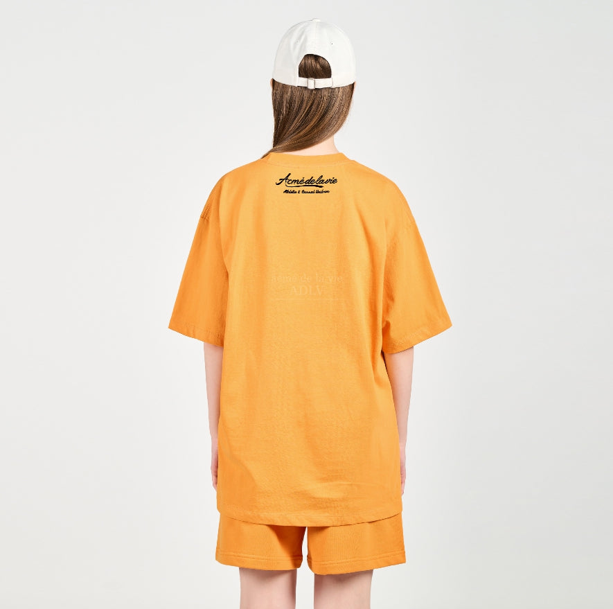 アクメドラビ(acme' de la vie) GEL PRINTING LOGO SHORT SLEEVE T-SHIRT ORANGE
