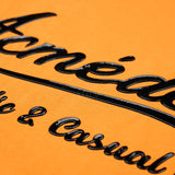 アクメドラビ(acme' de la vie) GEL PRINTING LOGO SHORT SLEEVE T-SHIRT ORANGE