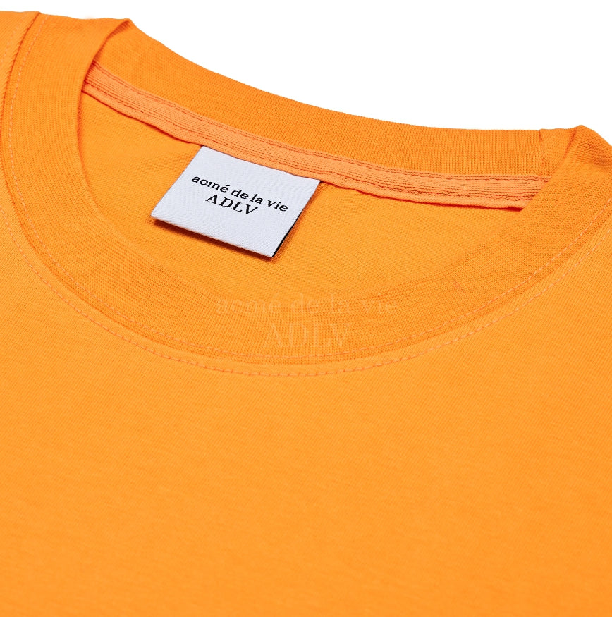 アクメドラビ(acme' de la vie) GEL PRINTING LOGO SHORT SLEEVE T-SHIRT ORANGE