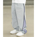 マスノウン(MASSNOUN)  CURVED ONE TUCK PLEATS MESH TRACK PANTS MSFTP001-GB