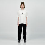 アクメドラビ(acme' de la vie) BACK SPREAD SLOGAN SHORT SLEEVE T-SHIRT BLUE