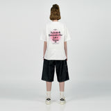 アクメドラビ(acme' de la vie) BACK SPREAD SLOGAN SHORT SLEEVE T-SHIRT PINK