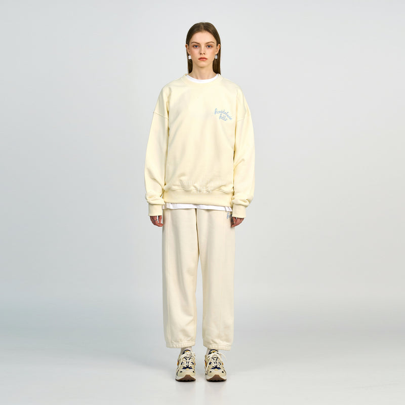 アクメドラビ(acme' de la vie) SCRIPT LOGO EMBROIDERY SWEATSHIRT IVORY