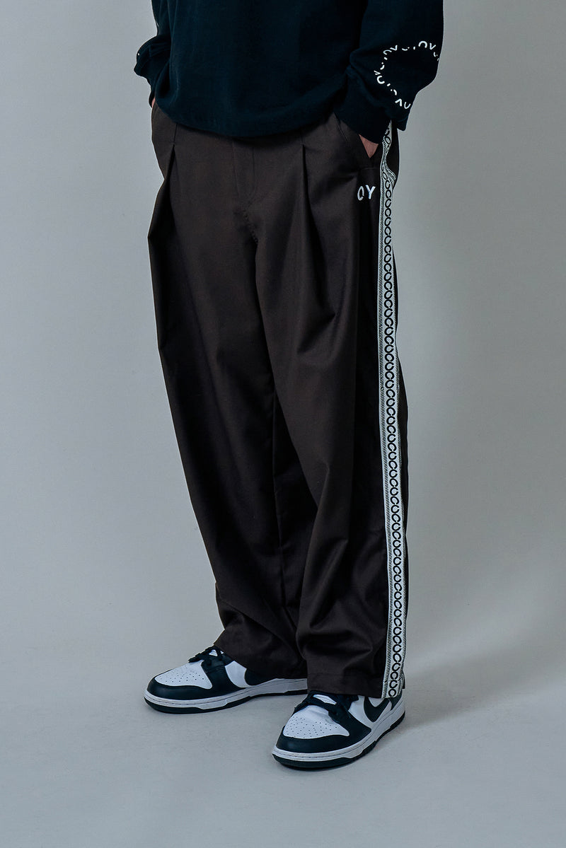 オーワイ(OY) ETHNIC TAPE PANTS-BROWN
