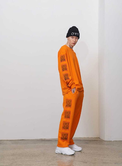 オーワイ(OY) STITCH TAPE PANTS (オレンジ)