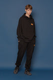 スローアシッド(SLOW ACID)  Leather Patch Sweatpants (BLACK)