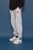 スローアシッド(SLOW ACID) Leather Patch Sweatpants (PALE MELANGE)