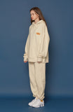 スローアシッド(SLOW ACID) Leather Patch Sweatpants (IVORY)