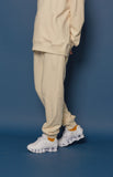 スローアシッド(SLOW ACID) Leather Patch Sweatpants (IVORY)