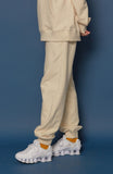 スローアシッド(SLOW ACID) Leather Patch Sweatpants (IVORY)