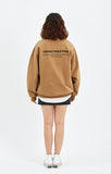 セイントペイン(SAINTPAIN) SP ELLIPSE LOGO CREW NECK-BROWN