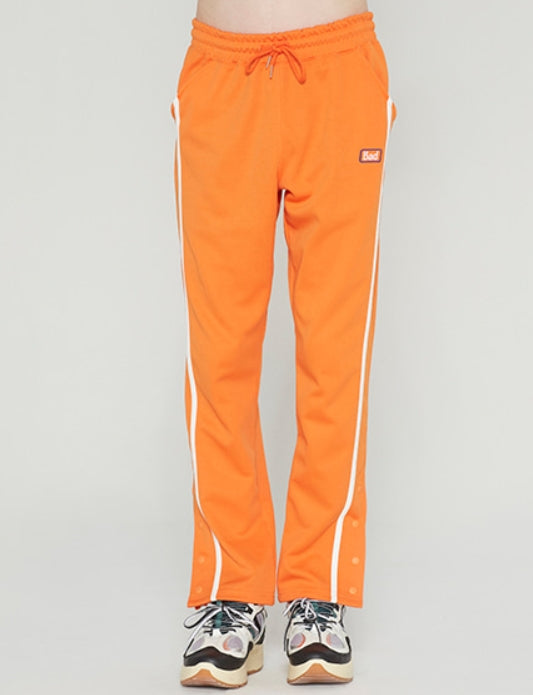 ベドインベド(BADINBAD)SIDE BUTTON PANTS_ORANGE