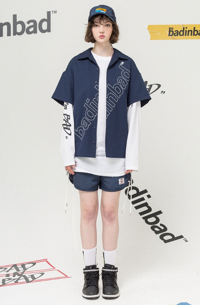 ベドインベド(BADINBAD)Outline Font Shirt_Navy