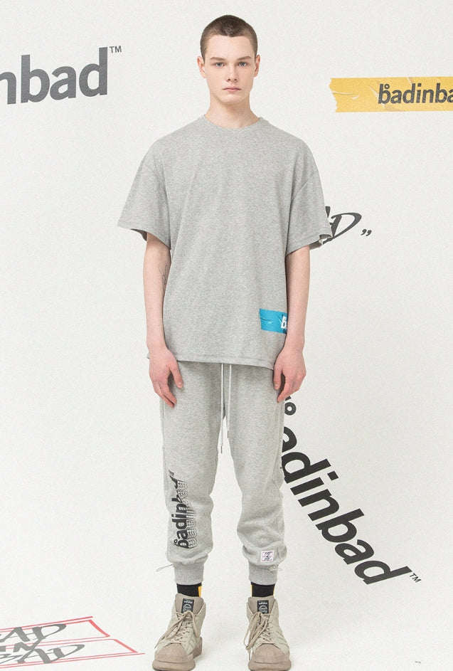 ベドインベド(BADINBAD)Logo Tape T Shirt_Grey