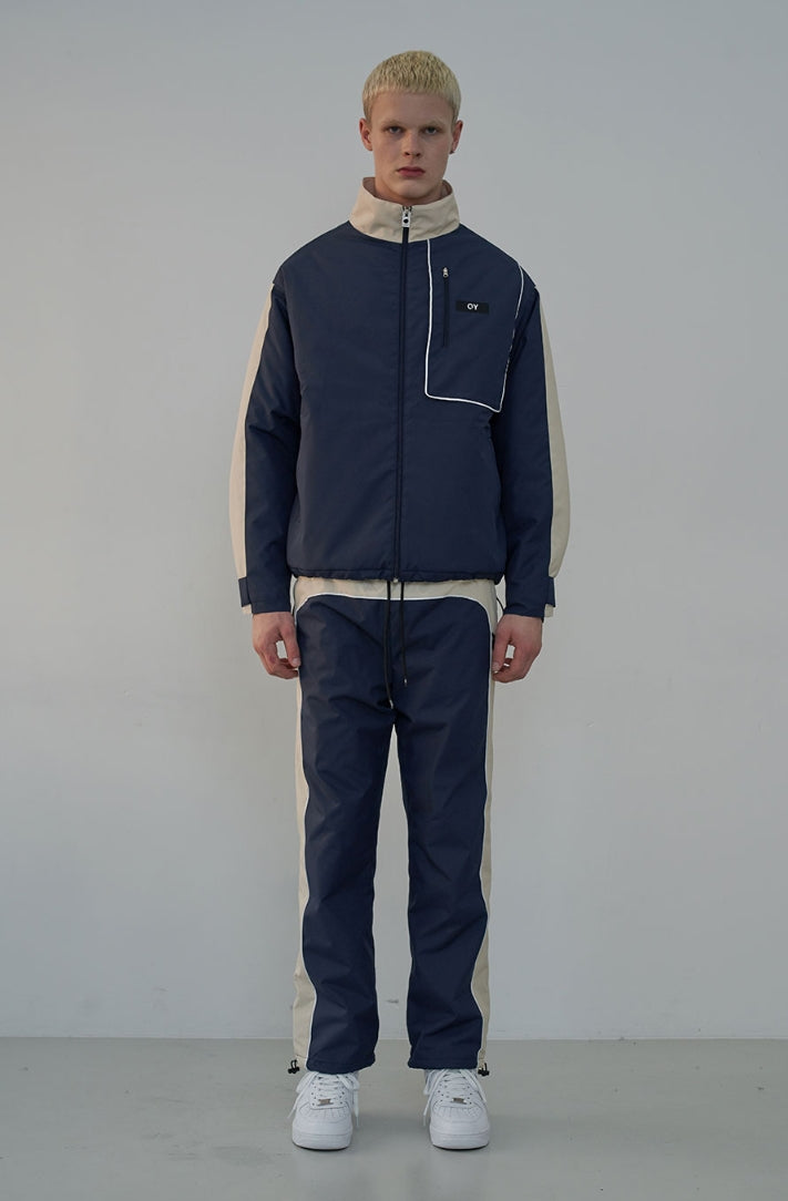 オーワイ(OY) PIPING BLOCK TRACK PANTS-NAVY