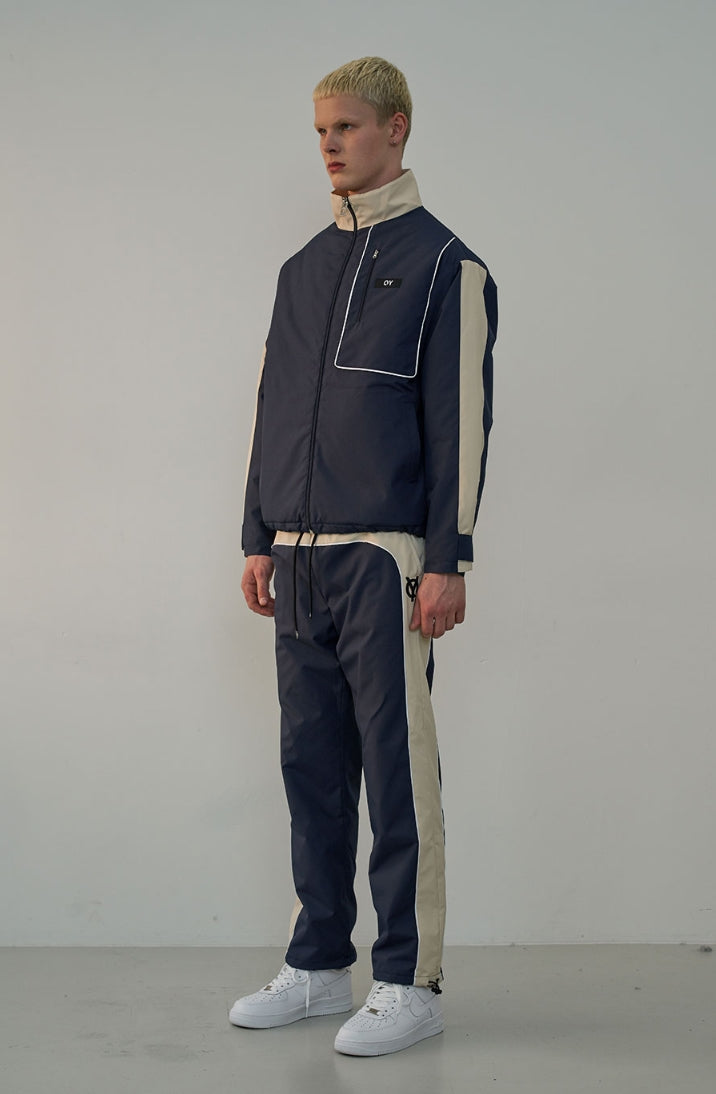 オーワイ(OY) PIPING BLOCK TRACK PANTS-NAVY