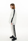 オーワイ(OY) UNBALANCE TAPE TRACK PANTS-WHITE