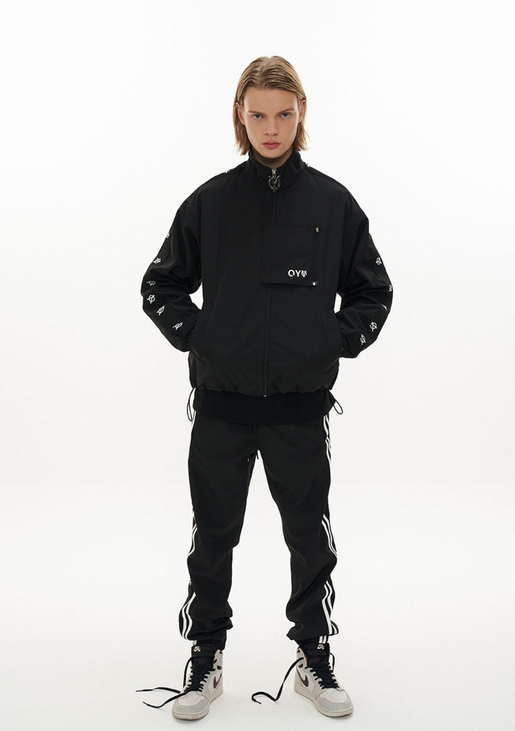 オーワイ(OY) UNBALANCE TAPE TRACK PANTS-BLACK
