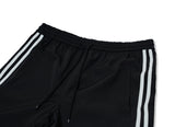 オーワイ(OY) UNBALANCE TAPE TRACK PANTS-BLACK