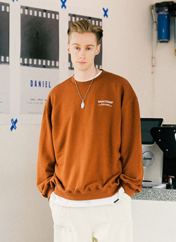 セイントペイン(SAINTPAIN) SP VRTN LOGO CREW NECK-BROWN